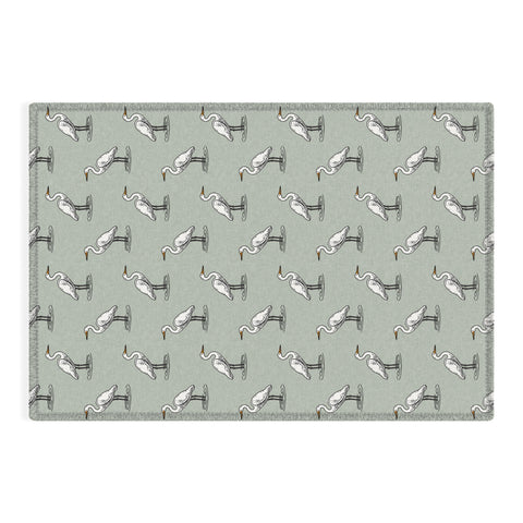Little Arrow Design Co egrets on light sage Outdoor Rug
