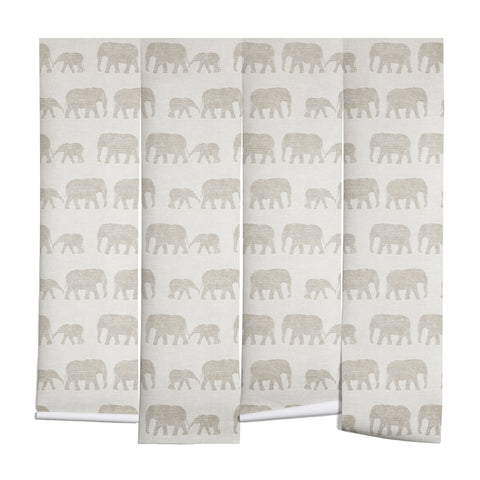 Little Arrow Design Co elephants marching khaki Wall Mural