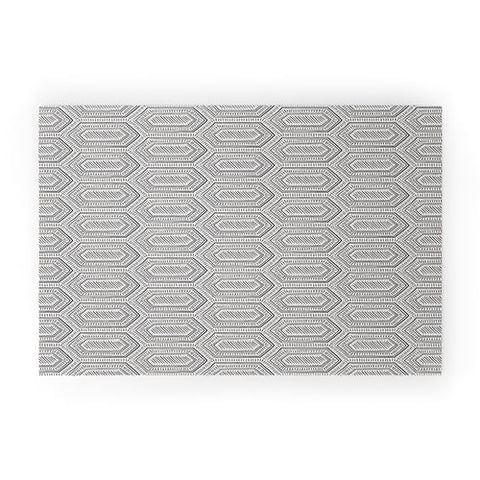 Little Arrow Design Co hexagon boho tile in charcoal Welcome Mat