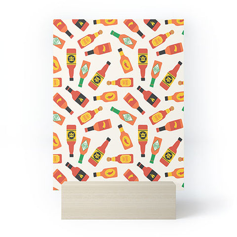 Little Arrow Design Co hot sauce bottles on cream Mini Art Print