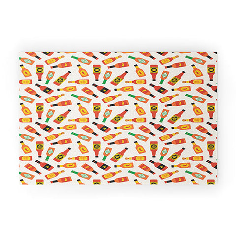 Little Arrow Design Co hot sauce bottles on cream Welcome Mat
