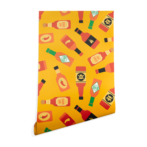 Little Arrow Design Co hot sauce bottles on yellow Wallpaper