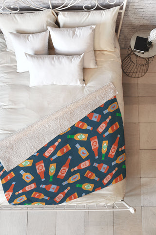 Little Arrow Design Co hot sauces bottles on blue Fleece Throw Blanket