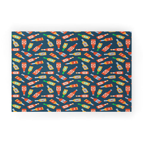 Little Arrow Design Co hot sauces bottles on blue Welcome Mat