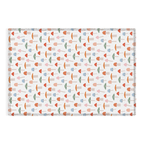 Little Arrow Design Co mushrooms on white Outdoor Rug