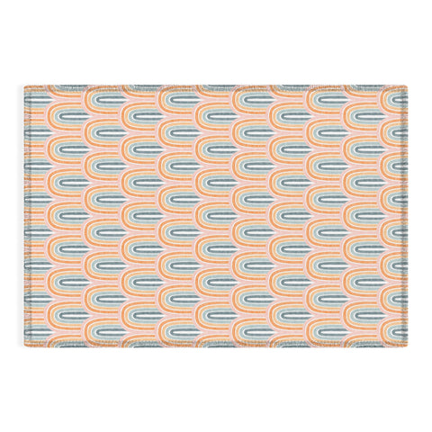 Little Arrow Design Co rainbow scallops pink Outdoor Rug