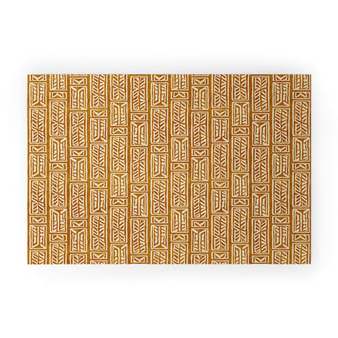 Little Arrow Design Co rayleigh feathers mustard Welcome Mat