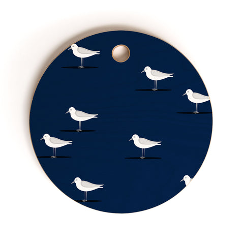 Little Arrow Design Co Sandpipers on navy Cutting Board Round