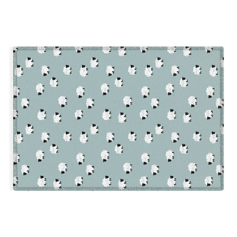 Little Arrow Design Co sheep on dusty blue Outdoor Rug
