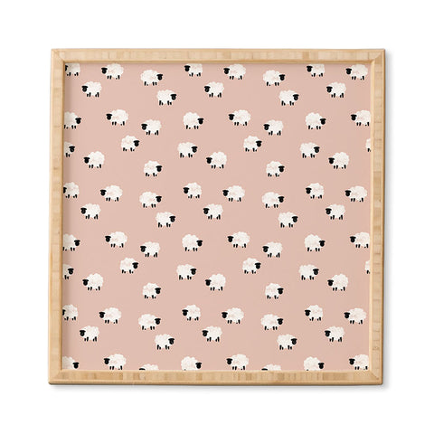 Little Arrow Design Co sheep on dusty pink Framed Wall Art