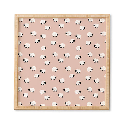 Little Arrow Design Co sheep on dusty pink Framed Wall Art