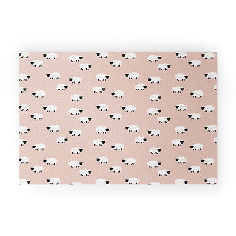 Little Arrow Design Co sheep on dusty pink Welcome Mat