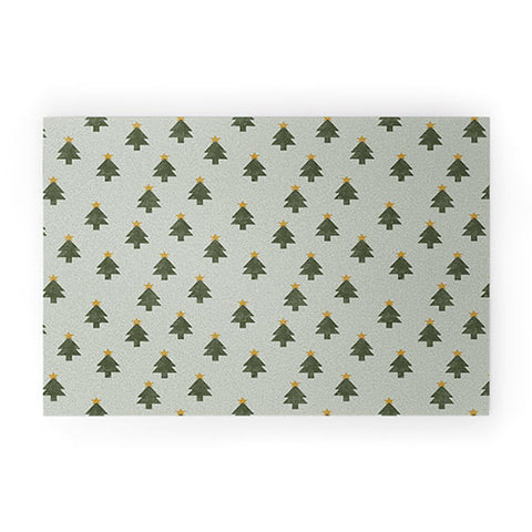 Little Arrow Design Co simple xmas trees on sage Welcome Mat