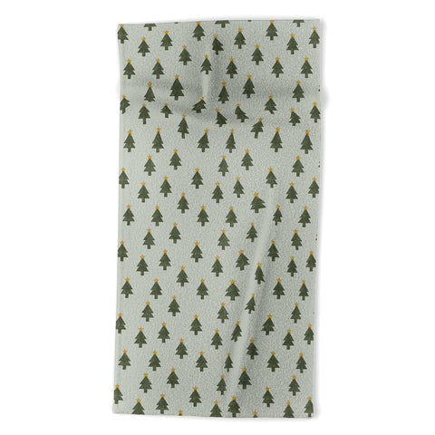 Little Arrow Design Co simple xmas trees on sage Beach Towel