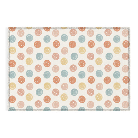 Little Arrow Design Co smiley faces neutrals Outdoor Rug