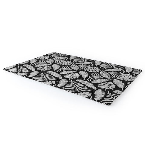 Little Arrow Design Co tropical leaves charcoal Area Rug
