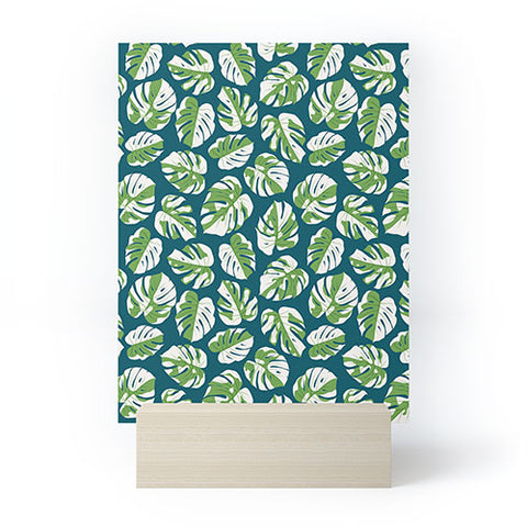 Little Arrow Design Co variegated monstera on blue Mini Art Print