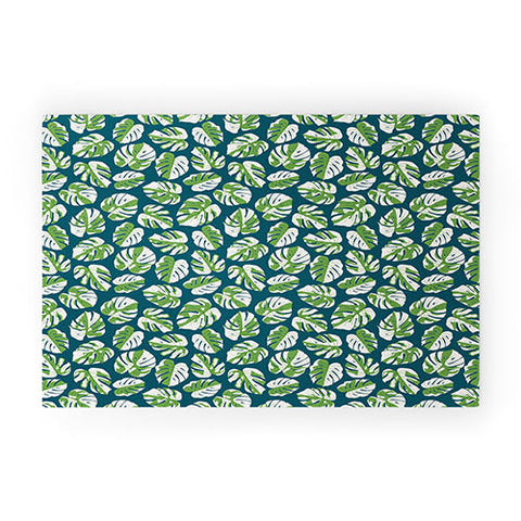 Little Arrow Design Co variegated monstera on blue Welcome Mat