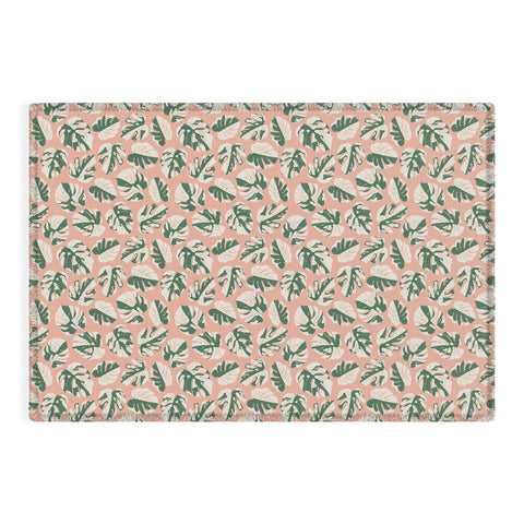 Little Arrow Design Co variegated monstera on pink Outdoor Rug