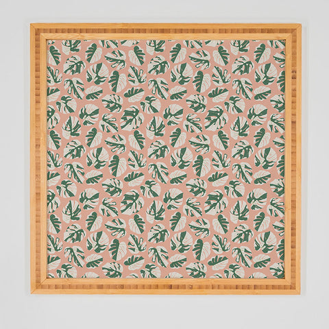Little Arrow Design Co variegated monstera on pink Framed Wall Art