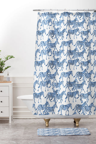 Little Arrow Design Co zebras in blue Shower Curtain And Mat