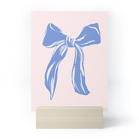 LouBruzzoni Light blue bow Mini Art Print