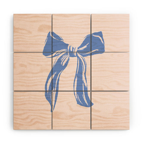 LouBruzzoni Light blue bow Wood Wall Mural