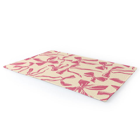 LouBruzzoni Pink bow pattern Area Rug