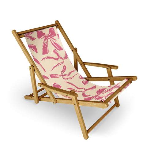 LouBruzzoni Pink bow pattern Sling Chair