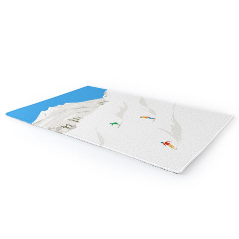 Lyman Creative Co Snowy Mountain Skiers Area Rug