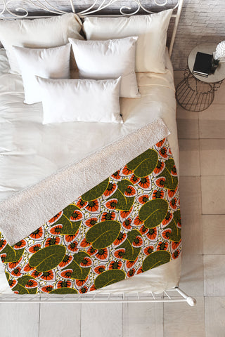 Marta Barragan Camarasa African leaves and flowers pattern Fleece Throw Blanket