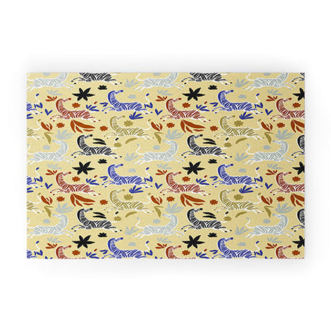 Marta Barragan Camarasa Herd of colorful zebras A Welcome Mat