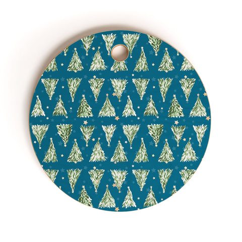 marufemia Holiday christmas tree over blue Cutting Board Round