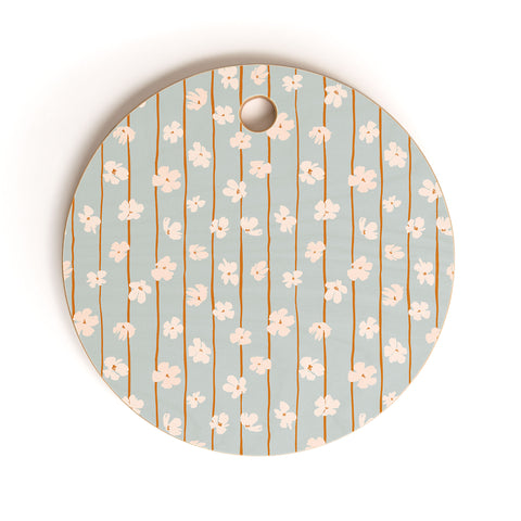 marufemia Peach flowers on green and orange Cutting Board Round