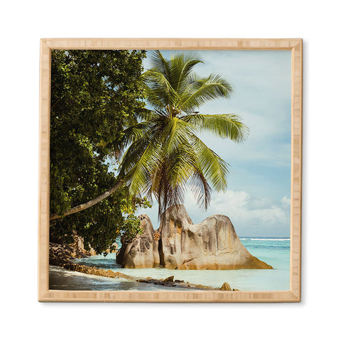 Pita Studios Palm tree bending over the sea Framed Wall Art