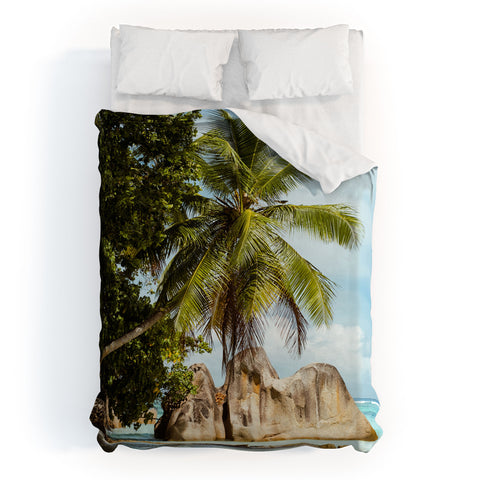 Pita Studios Palm tree bending over the sea Duvet Cover