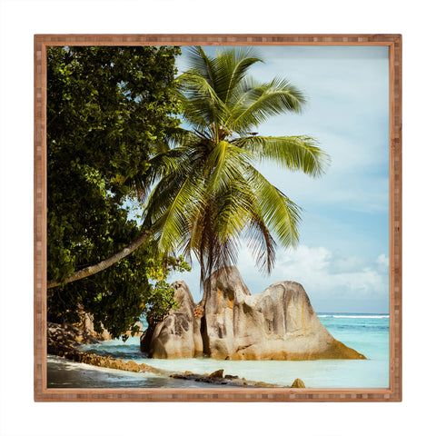 Pita Studios Palm tree bending over the sea Square Tray