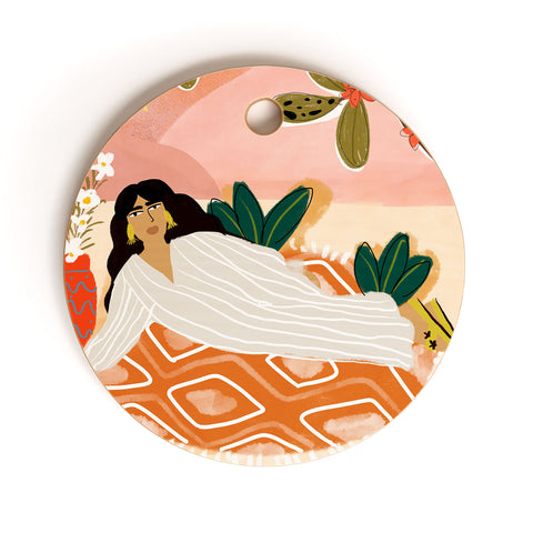 Alja Horvat Laying under the full moon Cutting Board Round