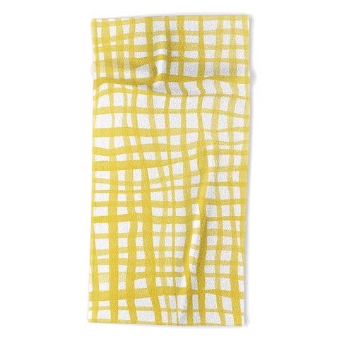 Angela Minca Yellow gingham doodle Beach Towel