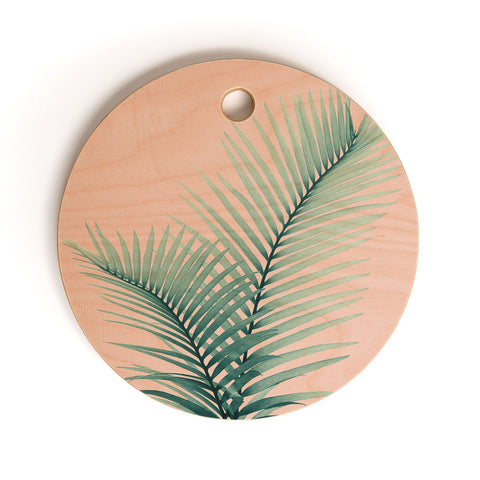 Anita's & Bella's Artwork Intertwined Palm Leaves in Love Cutting Board Round