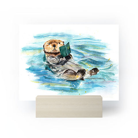 Anna Shell reading otter Mini Art Print