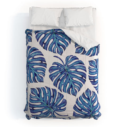 Avenie Tropical Palm Leaves Blue Comforter