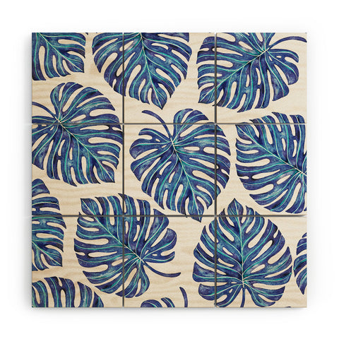 Avenie Tropical Palm Leaves Blue Wood Wall Mural