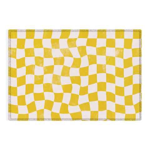 Avenie Warped Checkerboard Yellow Outdoor Rug