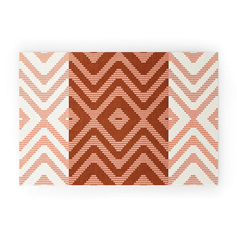 Becky Bailey Rattan in Rust Welcome Mat