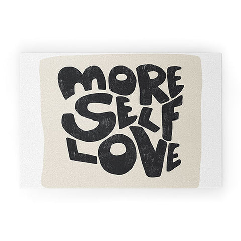Bohomadic.Studio Modern Self Love Art in Black Welcome Mat