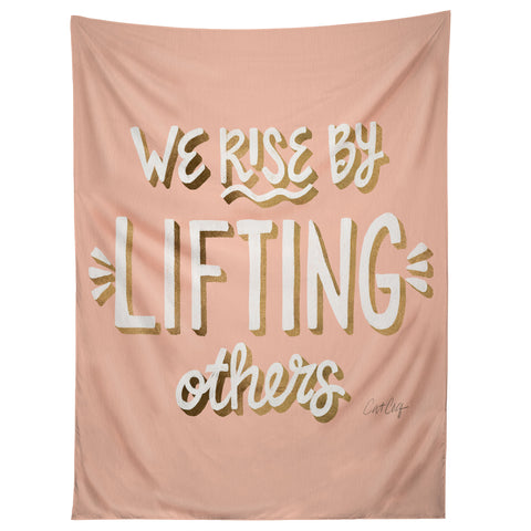 Cat Coquillette We Rise By Lifting Others Blush and Gold Tapestry