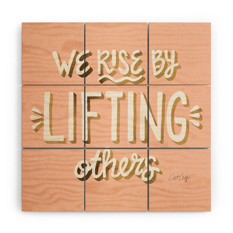Cat Coquillette We Rise By Lifting Others Blush and Gold Wood Wall Mural