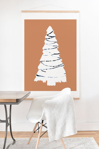 CayenaBlanca Cozy Christmas Tree Art Print And Hanger