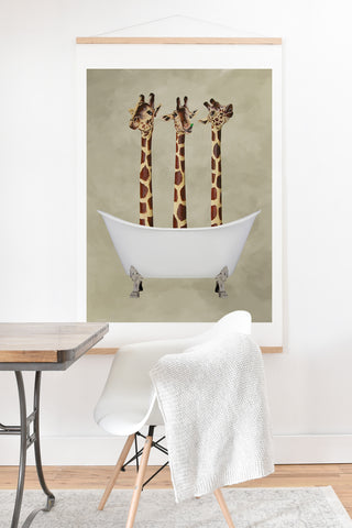 Coco de Paris 3 giraffes in bathtub Art Print And Hanger